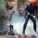 A person abseils down a canyon in Blue Mountains National Park.