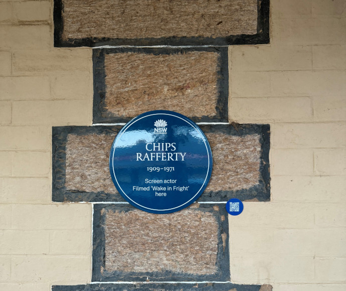Heritage blue plaque on the wall of Imperial Fine Accommodation in Broken Hill.
