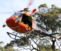 Crewman on NPWS helicopter skid