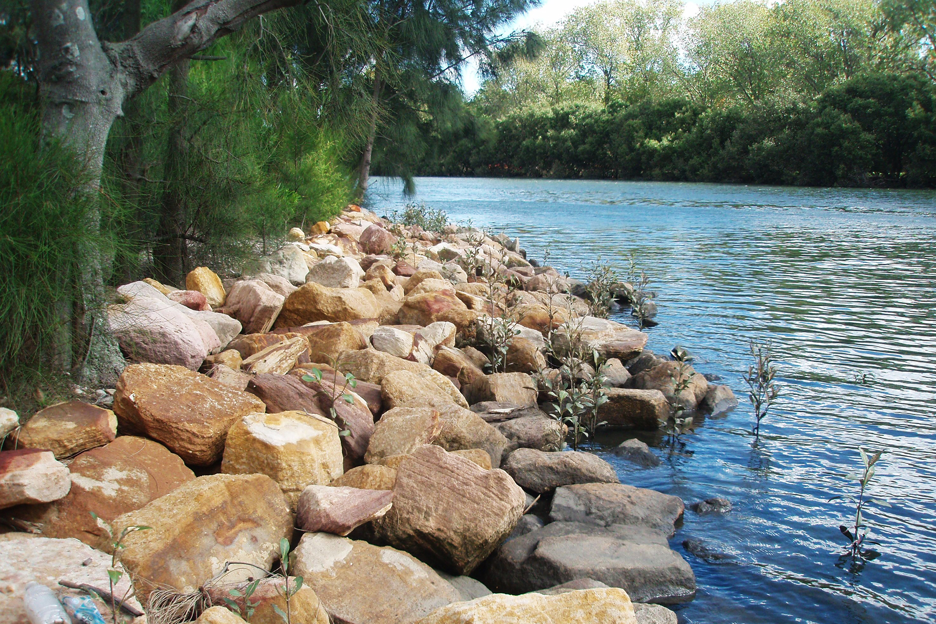 Blocks of stone on riverback